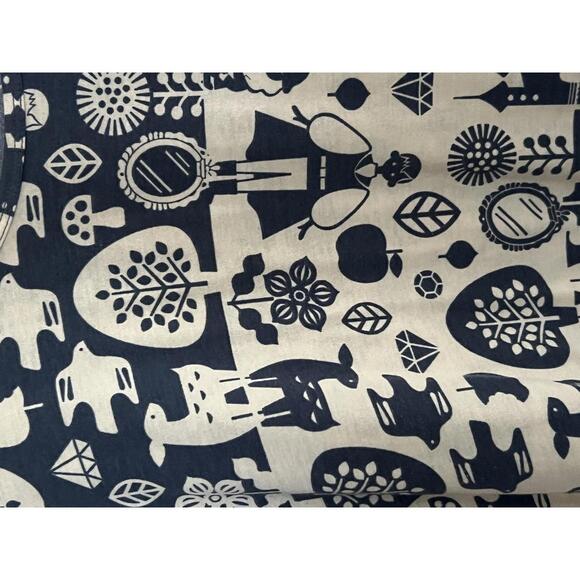 LuLaRoe Black and Cream Disney Patterned Tunic Top - Picture 3 of 5